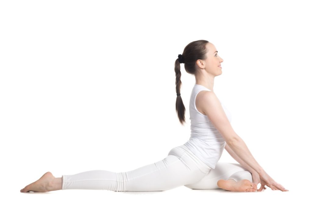 Half pigeon pose for hip stretches