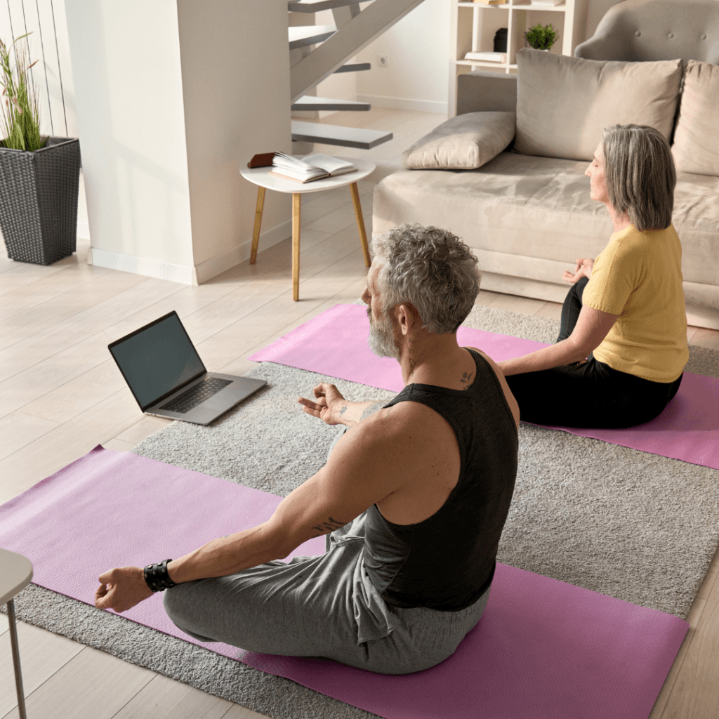 couple doing yoga at home